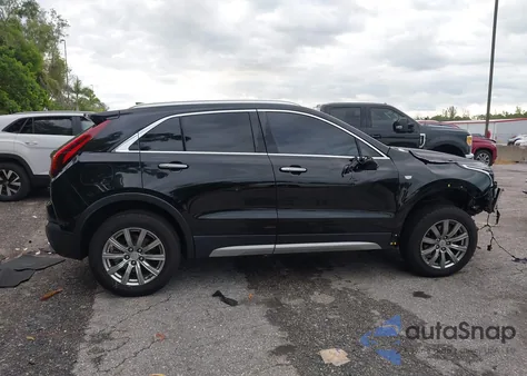 2020 Cadillac Xt4 Fwd Premium Luxury from USA, damaged, VIN 1GYFZCR43LF138960